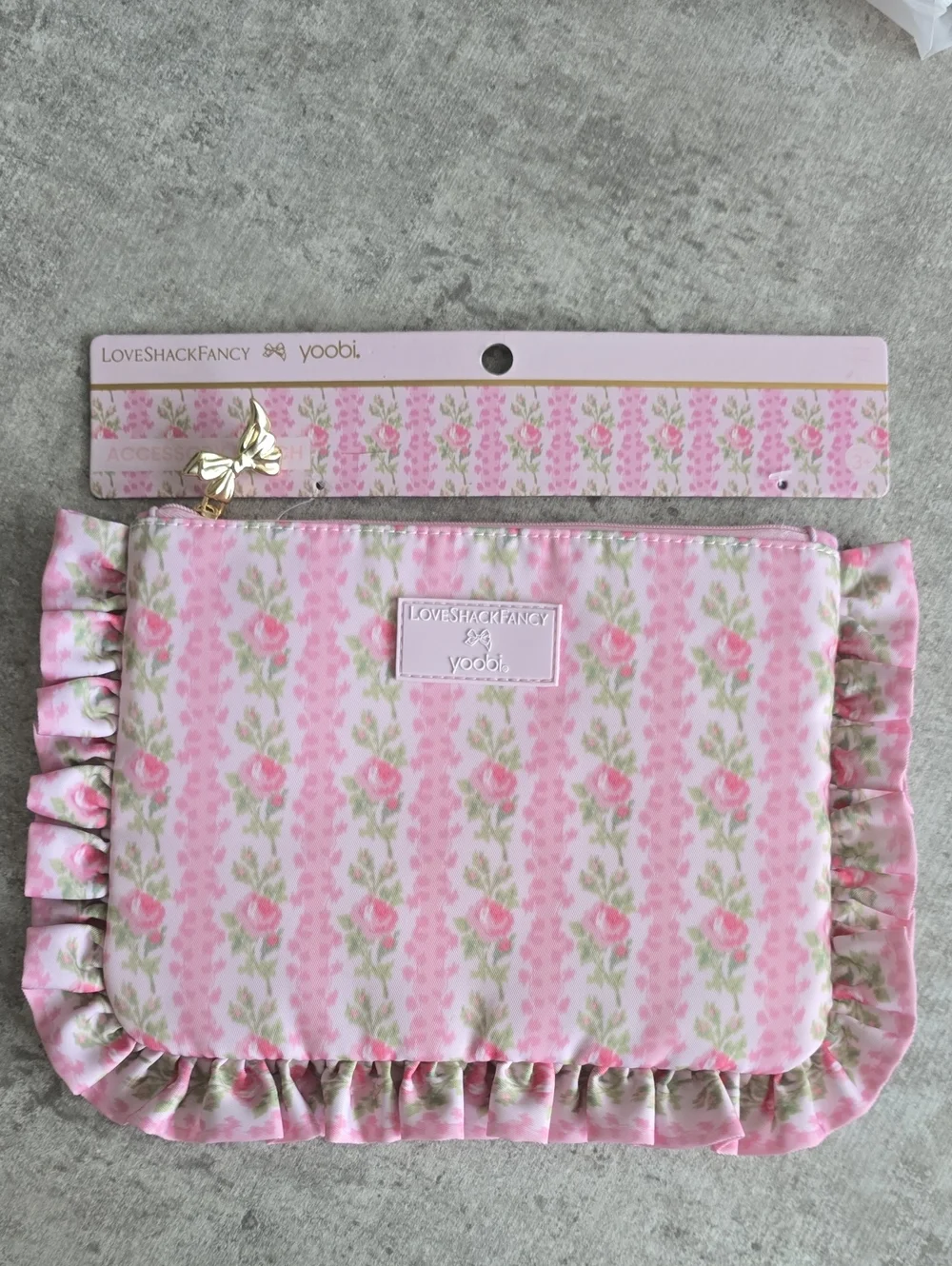 LoveShackFancy Pink Rose Print Ruffle Pouch with Gold Bow Charm
